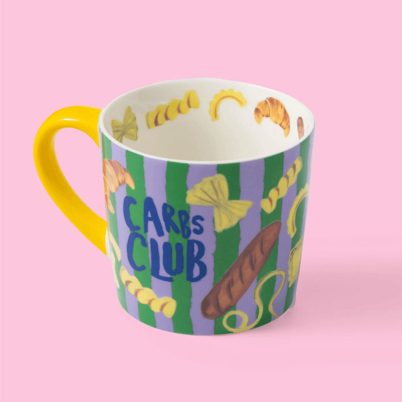 Eleanor Bowmer Carbs Club mug showing food illustrations around the inside rim