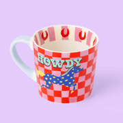 Eleanor Bowmer Howdy mug showing striped inner rim with red horseshoes