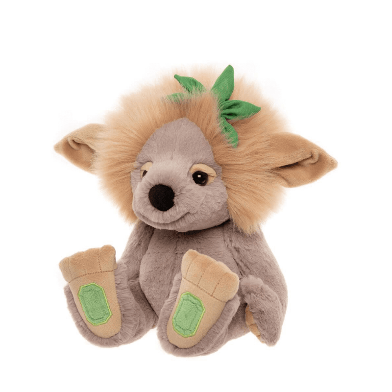 Emerald Lou Bearhouse by Charlie Bears crystal troll plush toy, side angled view with fluffy tan mane, green leaf detail and green crystal feet pads