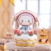 “Emma’s Birthday Cake” figure – bunny atop strawberry shortcake with pink hearts

