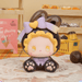 EMMA Bunny Collector Debut Series brown bunny figure with yellow bow and chocolate-inspired styling