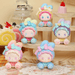 EMMA Bunny Collector Debut Series pastel bunny figures displayed on tiered dessert stands