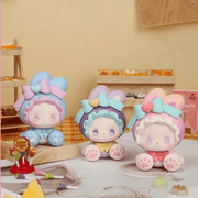 Three EMMA Bunny Collector Debut Series pastel bunny figures displayed together on a dessert table