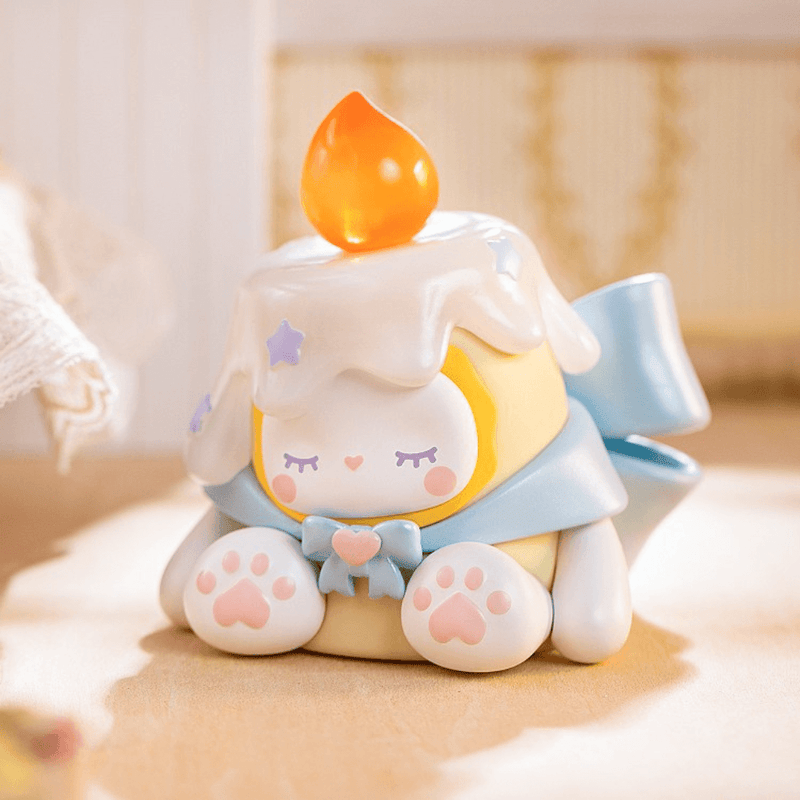 “Cake Candles” figure – sleepy Emma as melting candle with translucent flame topper
