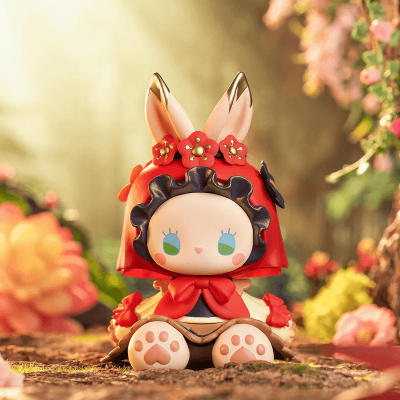 Begonia figure from Emma Secret Forest Blind Box, red‑hooded bunny with gold‑tipped ears
