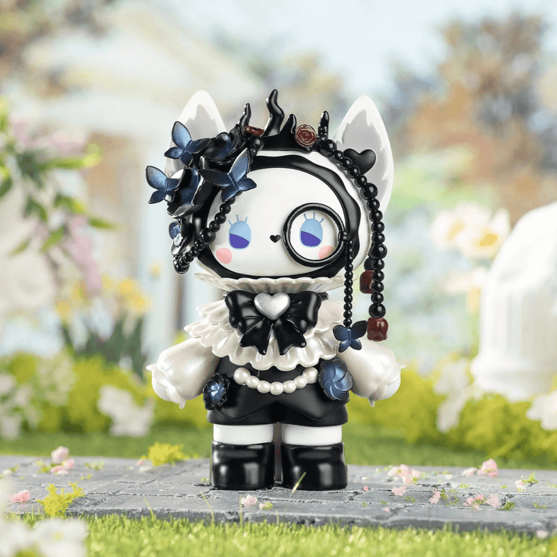 Bramble figure from Emma Secret Forest Garden Date Blind Box collectables, gothic black‑and‑white bunny with blue blooms
