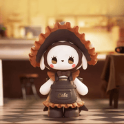 Barista bunny in frilled apron and café bonnet, standing on tiled floor – Blind Box collectable
