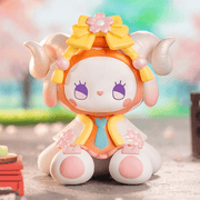 Sakura Onigiri bunny with yellow bow, peach horns and rice-ball palette – Emma Secret Forest blind box

