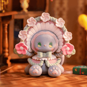 “Emma’s Wreath” figure – grey cat Emma in ruffled flower bonnet with roses
