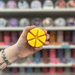 Evening Song yellow segmented wax melt held in hand