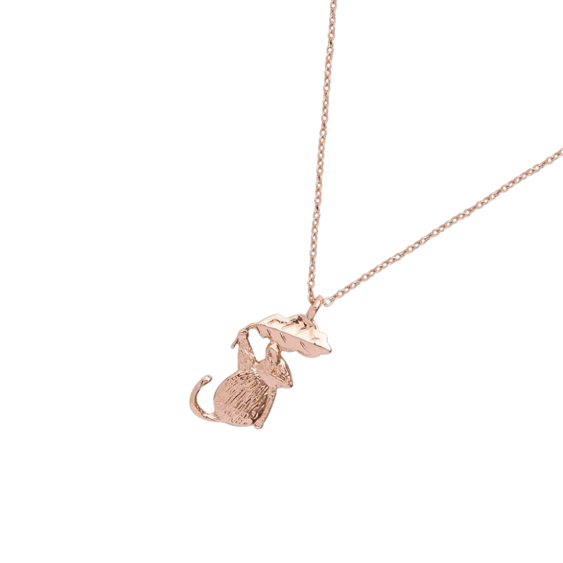 Reverse of Fable England rose gold dormouse necklace showing the textured mouse charm, curled tail and oak leaf