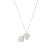 Open silver heart locket necklace showing two hinged compartments for treasured photographs