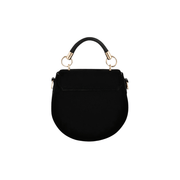 Plain black velvet reverse of Fable England saddle bag with curved shape and top handle