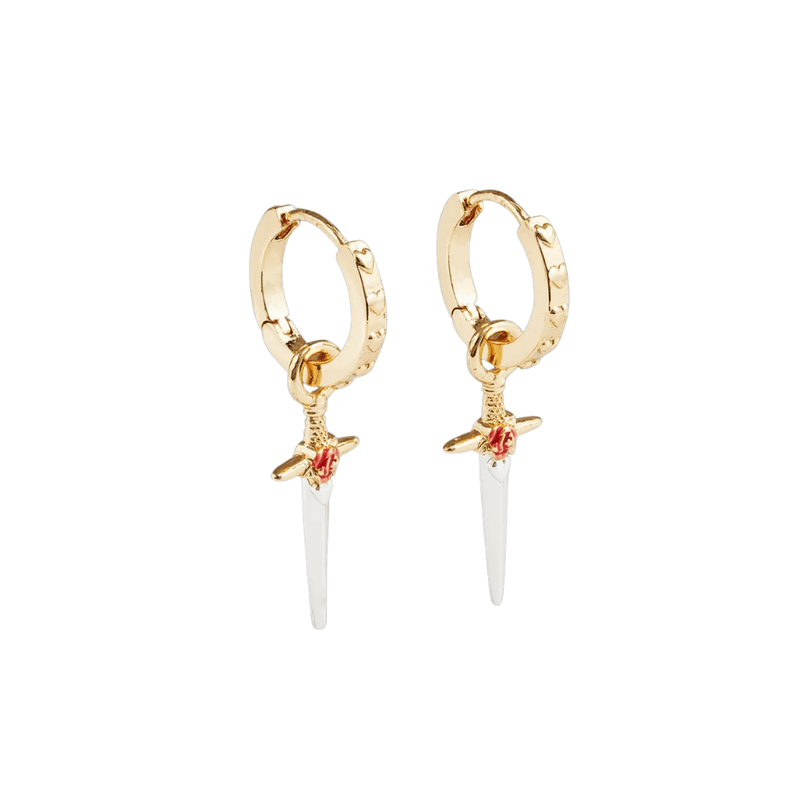 Angled view of gold heart-patterned huggie hoops with red rose and silver dagger charms