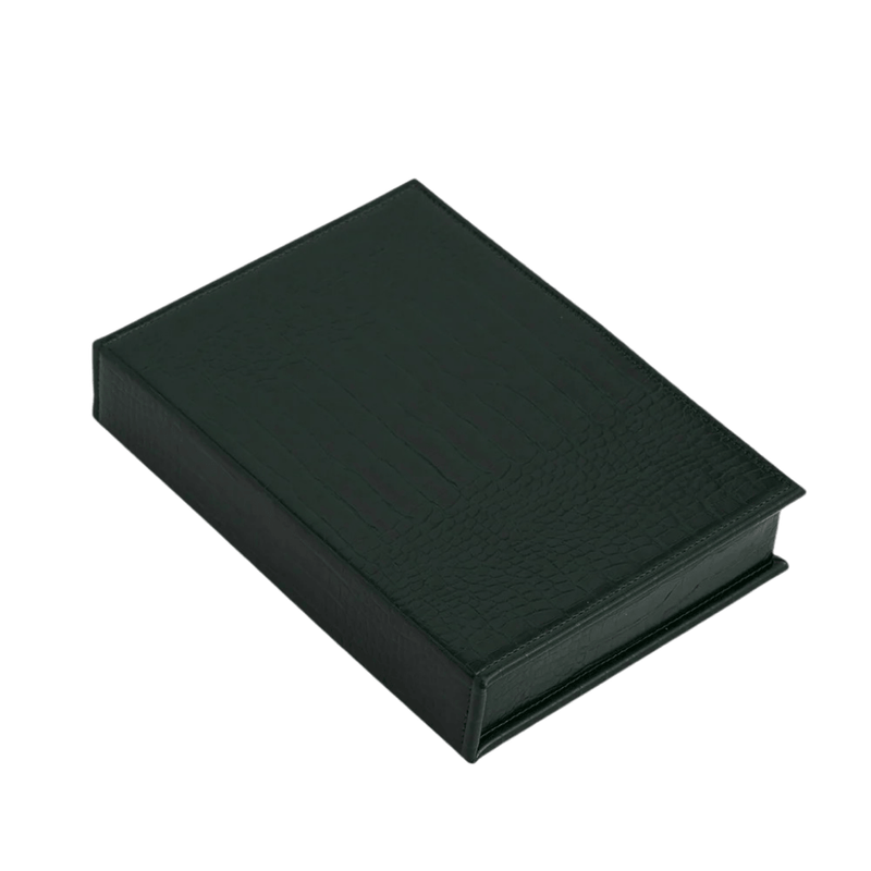 Forest-green book-shaped jewellery storage box lying closed with textured faux leather cover