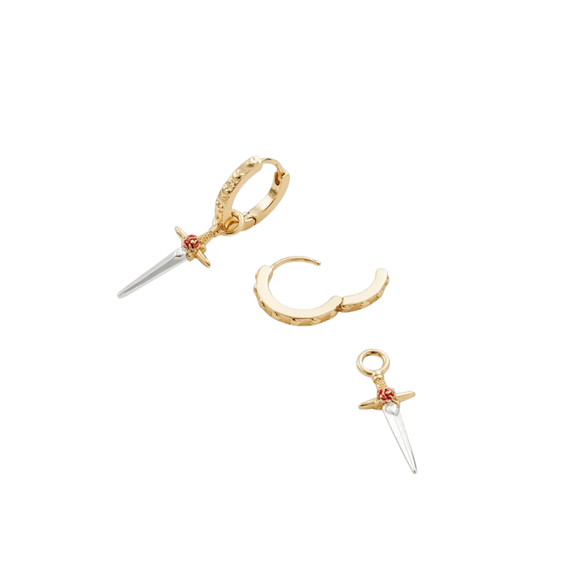 Fable England gold huggie earring shown with its detachable rose and dagger charm removed