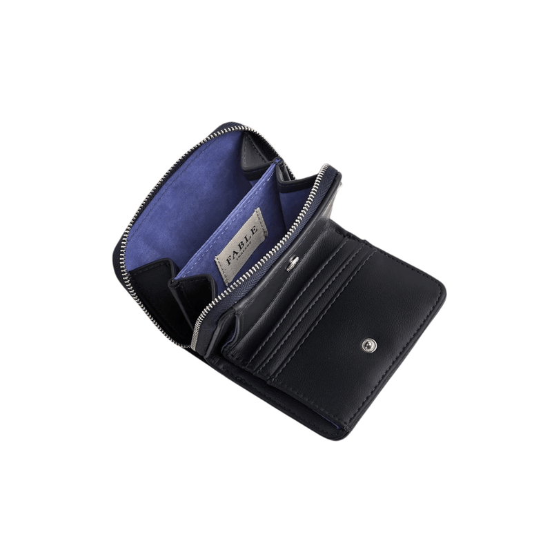 Open Fable England Selene purse showing card slots, press-stud closure, zip compartment and blue lining