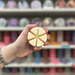 Fairy Dust cream segmented wax melt held in hand
