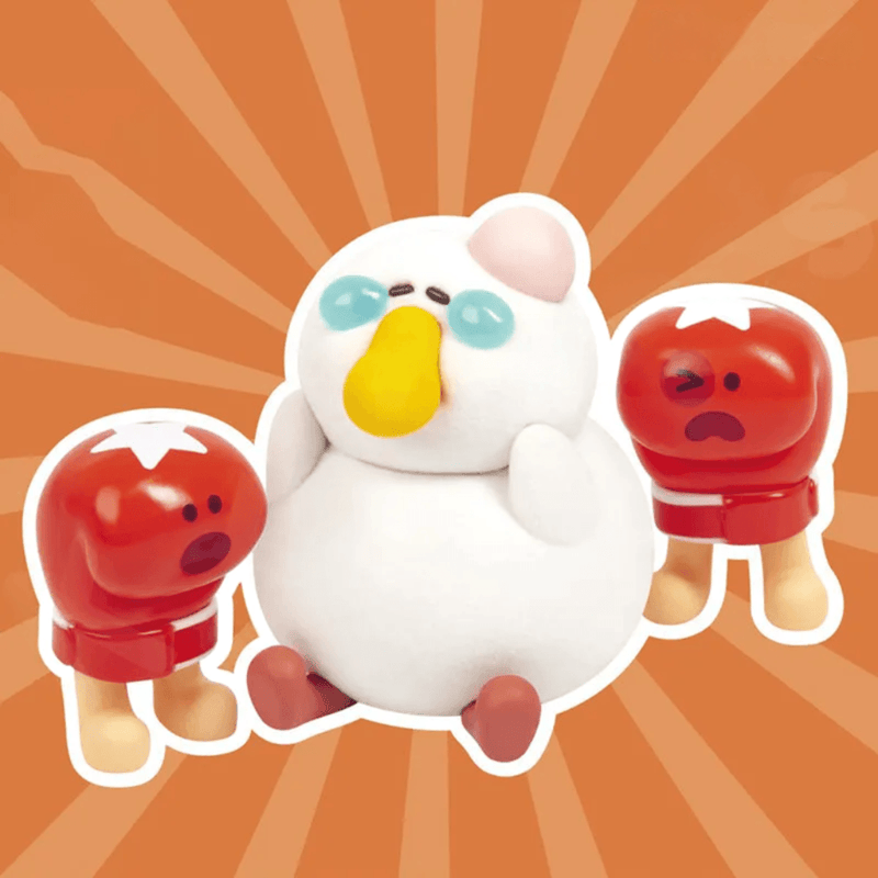 Punchline Fatgoose seated with red boxing characters from the Fat Goose GYM collection