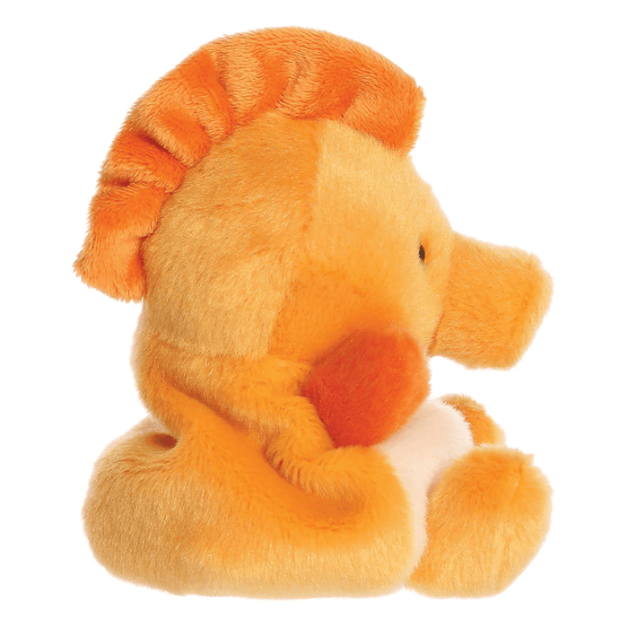 Side view of Felipe Seahorse Palm Pals plush showing orange fins, curled tail, soft plush body and seahorse profile.