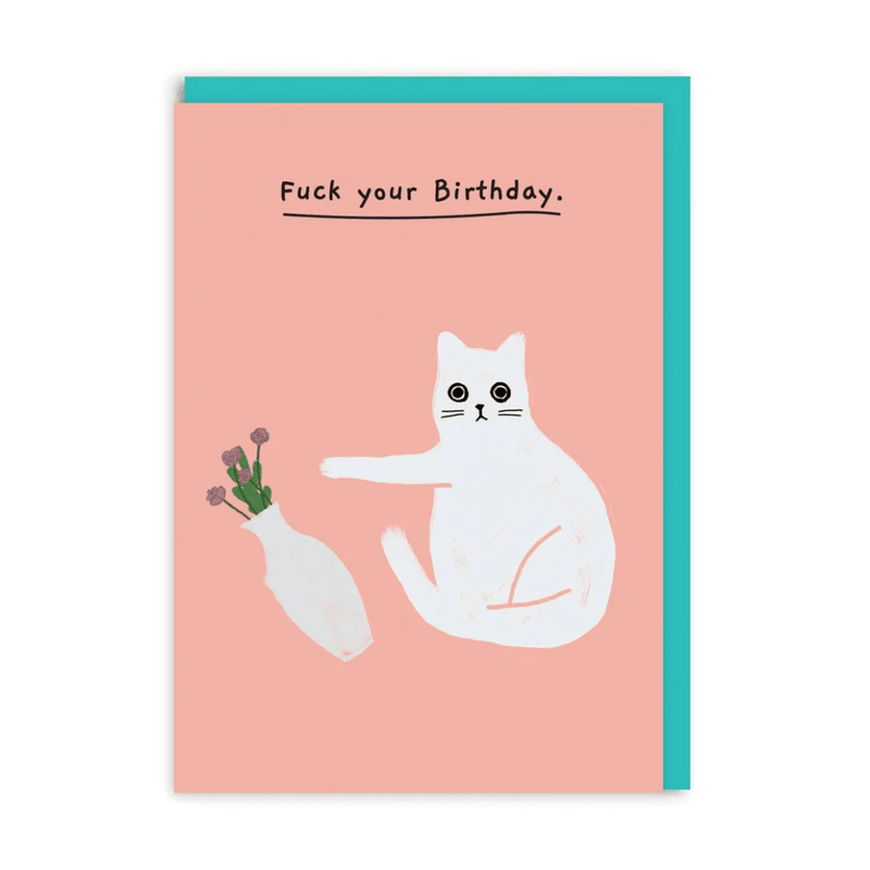 Sweary birthday greeting card with white cat knocking vase on pink background, caption ‘Fuck your Birthday’
