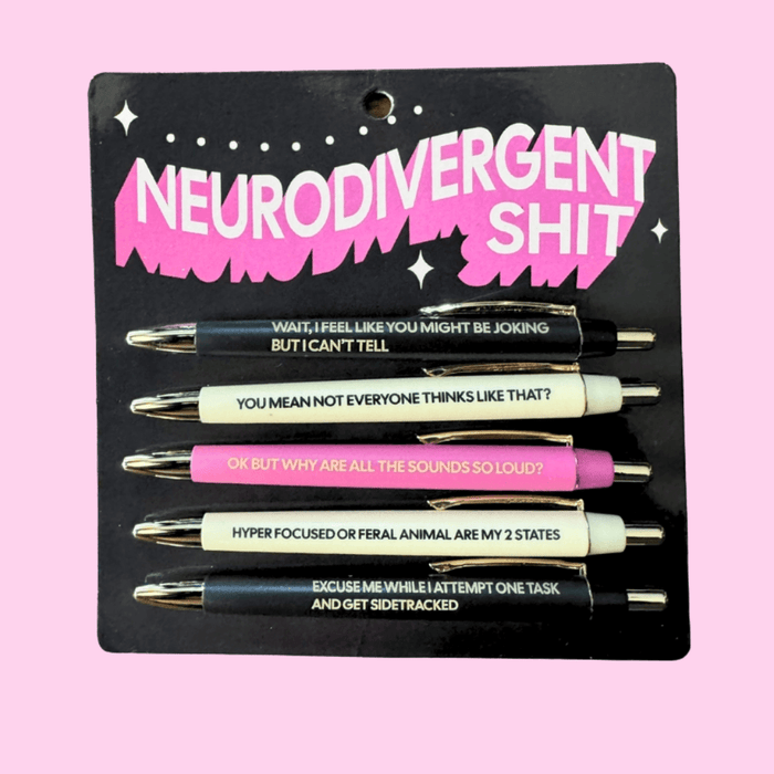 Fun Club Neurodivergent Shit pen set with 5 black ink ballpoint pens featuring funny neurodivergent-themed phrases on black, pink and white packaging
