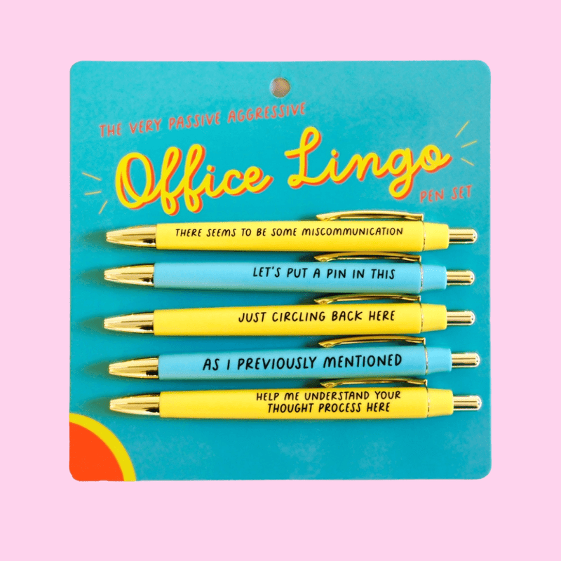 Fun Club Office Lingo Pen Set with 5 black ink ballpoint pens featuring funny passive aggressive office phrases on retro-style packaging