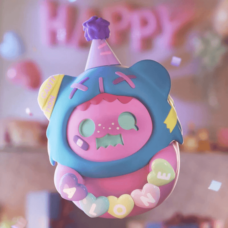 Party-hat Ghost Bear in blue hoodie with pastel heart beads spelling ALONE—“Birthday Alone” Blind Box figure
