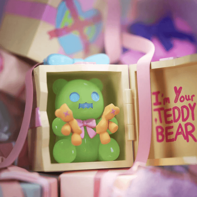 General hidden “I’m Yours” green Ghost Bear in wooden gift box gripping twin plushies

