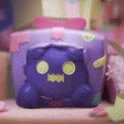 Purple present Ghost Bear figure with gold eyes bursting from gift box—“No Gift For Me?” Blind Box collectable
