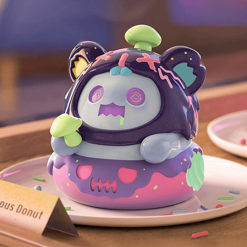 “Danger Donut” figure—purple-iced ghost bear with zombie swirl eyes and green ooze.
