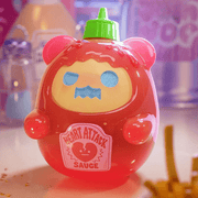 “Hot Sauce” mini—red sauce-bottle bear with ‘Heart Attack’ label and green cap.
