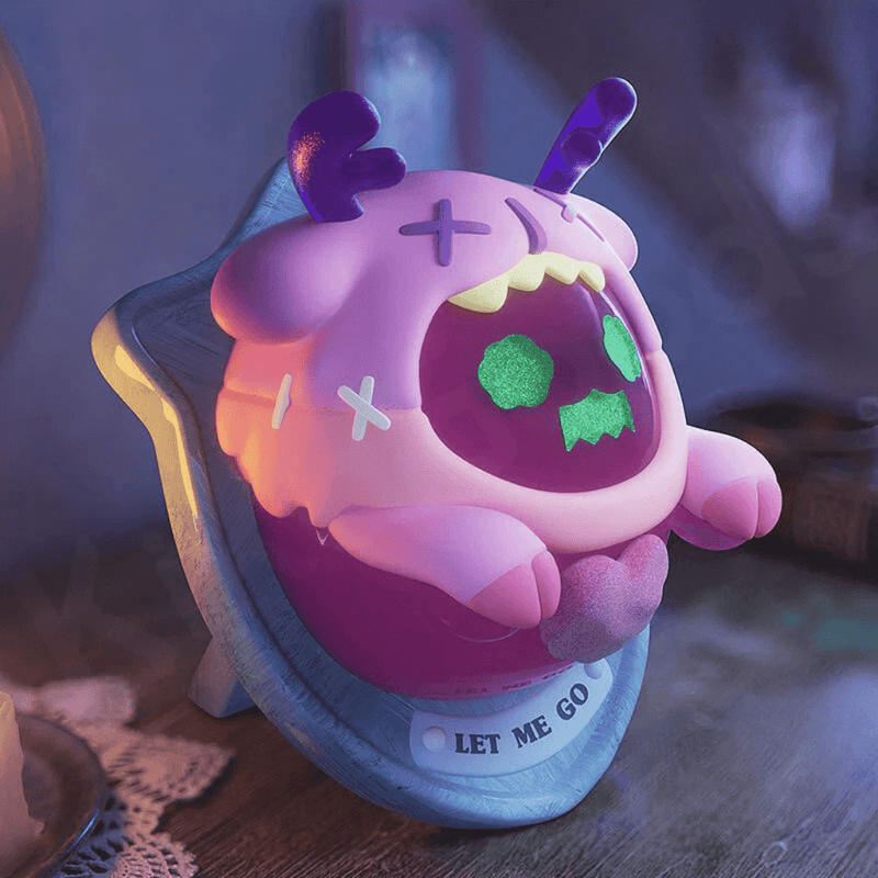 Super-hidden “Let Me Go”—pink Ghost Bear on wooden plaque, purple antlers flailing.
