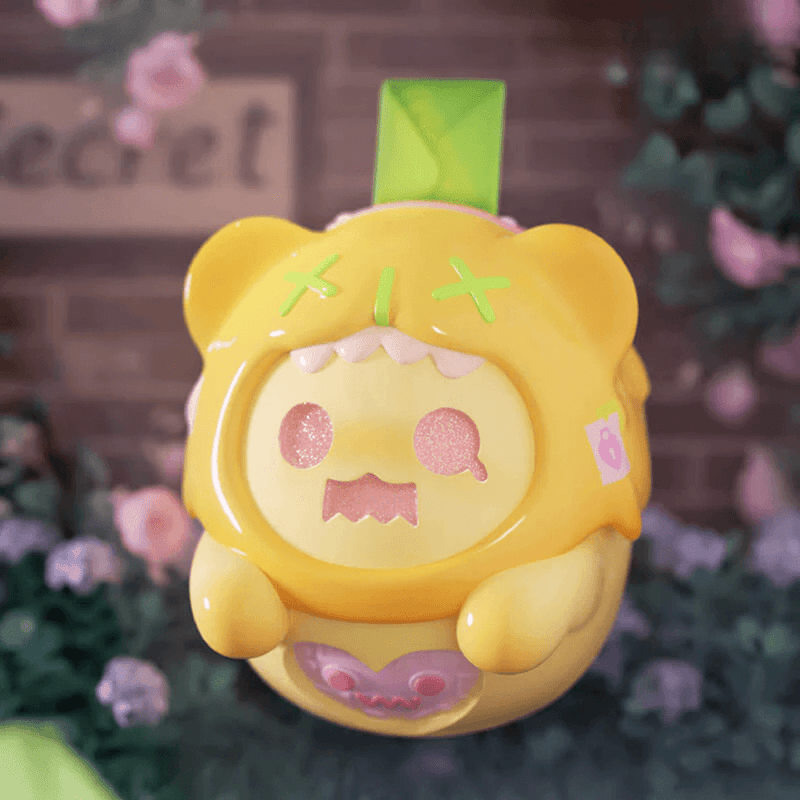 “Secret Keeper” yellow Ghost Bear with green envelope tag – The Secret Bear Garden blind-box collectable
