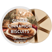 Ginger Cinnamon Biscuits segmented cream wax melt pot with festive plate of sprinkled ginger biscuits and cinnamon sticks