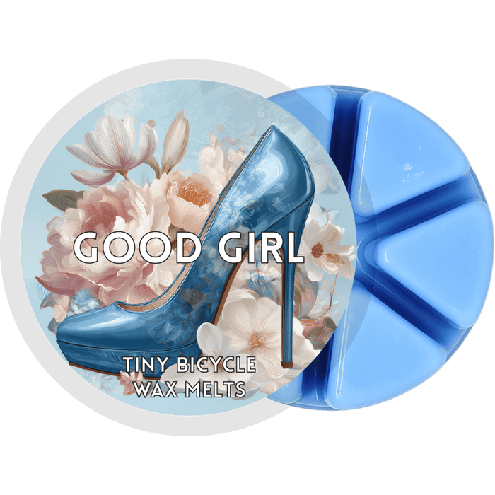 Good Girl segmented wax melt pot with blue wax segments and floral high heel label design