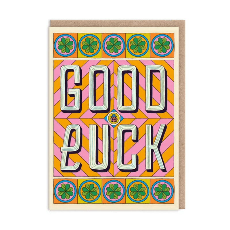 Colourful Good Luck typographic greeting card by Frieda Ruh with four-leaf clovers