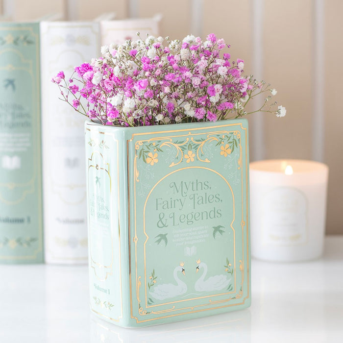 Book shaped vases for flowers displayed as bookish home decor