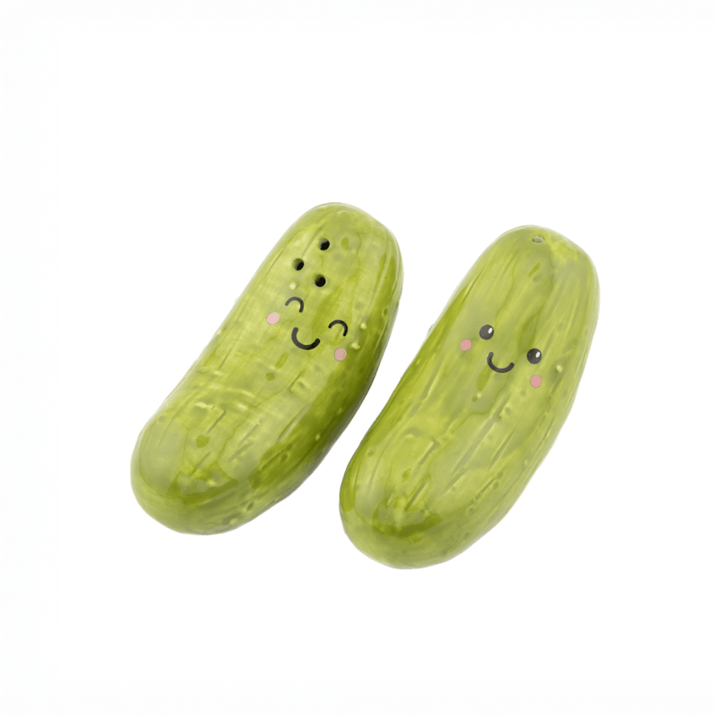 Set of two green pickle-shaped salt and pepper shakers with smiling faces
