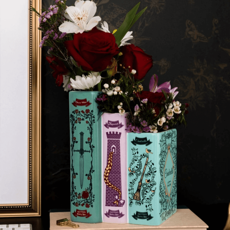 Grimm’s Fairy-Tale triple book vase styled with mixed flowers