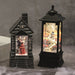 Halloween skeleton couple lantern glowing on a tabletop

