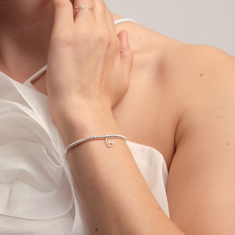 “Model wearing Happy 21st Birthday diamond heart bracelet by Joma Jewellery”
