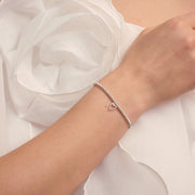 Model wearing Happy 40th Birthday diamond heart bracelet by Joma Jewellery