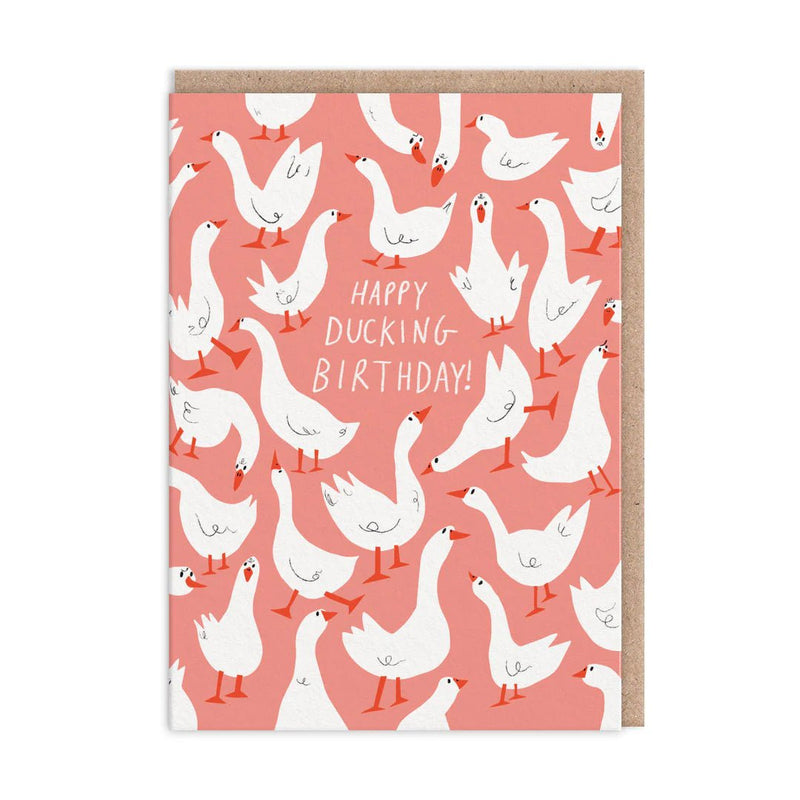 Coral birthday card with white ducks pattern and hand-lettered Happy Ducking Birthday, A6 with kraft envelope
