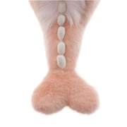 Close-up of Hearts pink dragon plush from Bearhouse by Charlie Bears 2025, showing soft spine detail and fluffy tail on a white background