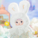 HiChance & HiTOY Weather Forecast Rainbow plush blind box doll in white bunny hood with pastel rainbow ear details.