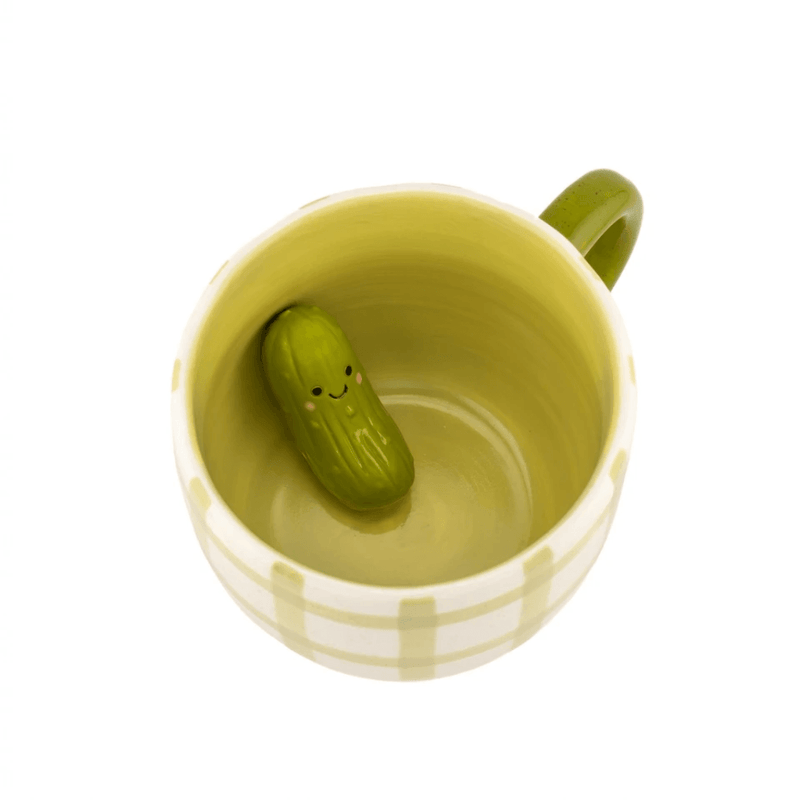 Hidden smiling pickle inside Sass & Belle Surprise Pickle Mug