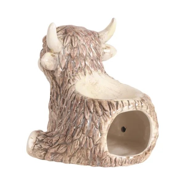 Rear view of Highland Cow wax melt burner showing tealight opening