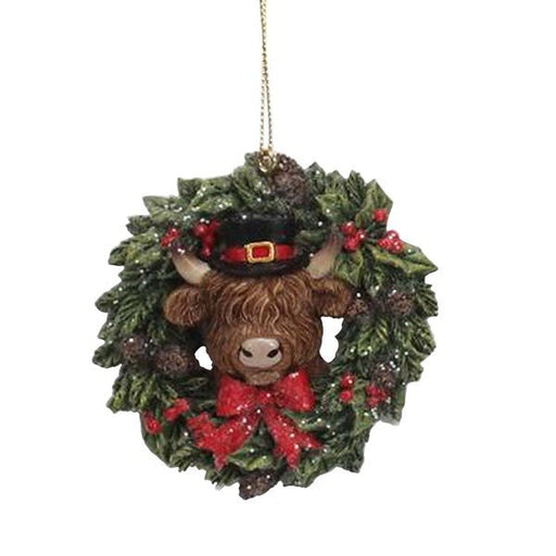 Highland Cow in top hat inside holly wreath with red bow, 8cm Christmas tree decoration.

