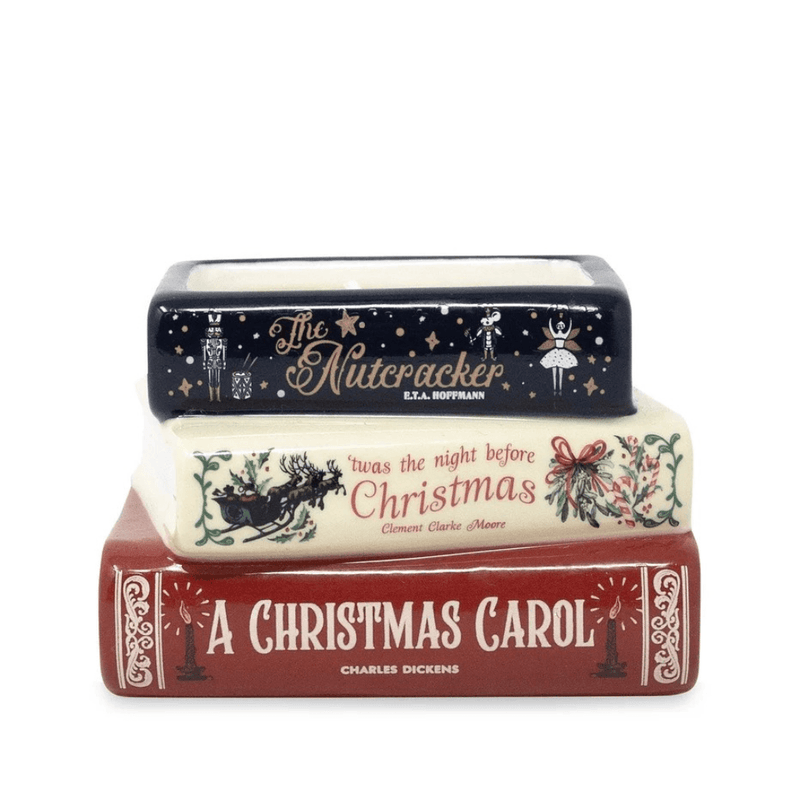 Unlit Holiday Classics ceramic candle shaped like a stack of The Nutcracker, 'Twas the Night Before Christmas and A Christmas Carol books
